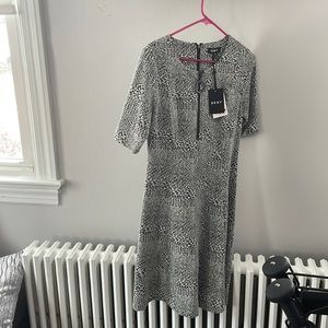 NEVER WORN. TAGS ON. DKNY DRESS. SIZE 6